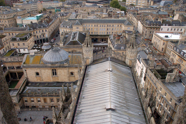 The Roman Great Bath, the Thermae Spa's rooftop pool and Bath city center viewed from atop Bath Abbey's Tower