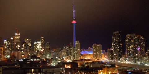 The CN Tower standing out against the night sky, viewed from the Thompson Hotel Rooftop Lounge Credit: Julie Kalan