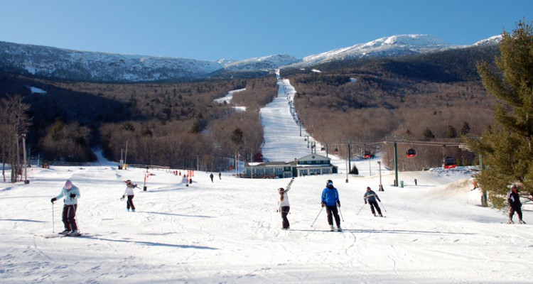 Skiers and Snowboarders enjoying a beautiful day on the slopes of Mount Mansfield, at the Stowe Mountain Resort Credit: Julie Kalan