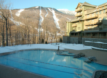 Mount Mansfield overlooking the inviting pool at the Stowe Mountain Resort Credit: Julie Kalan