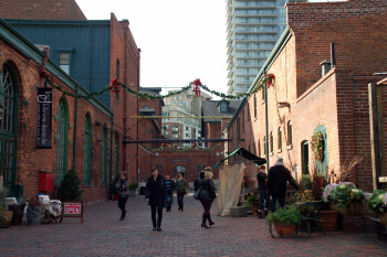 Strolling along Tank House Lane, in the heart of the Distillery District. Credit: Julie Kalan