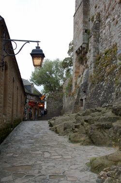 At the foot of the abbey, this peaceful lane follows the contours of the mo