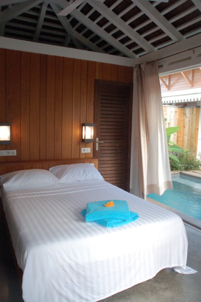 Enjoy a nap in the day bed alongside a private plunge pool at Plein Soleil.