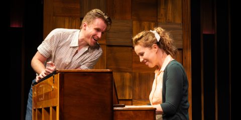 Tess Benger as Carole King (seated at the piano) and Darren Martens in the role of Gerry Goffin