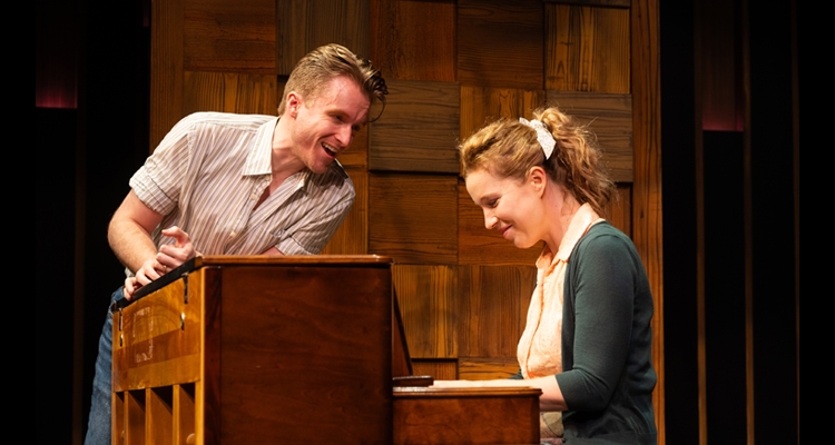 Tess Benger as Carole King (seated at the piano) and Darren Martens in the role of Gerry Goffin