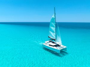 Arrive in style by catamaran
