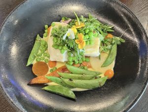 Poached halibut with English pea at 1 Elgin