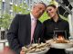 David Zaltzman and server Megan present the magnificent seafood tower at Moishes Steakhouse