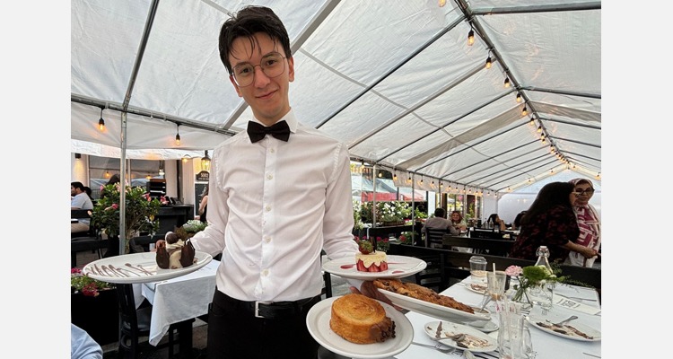 Duc de Lorraine General Manager Peter Maniatis serves up some decadent desserts.