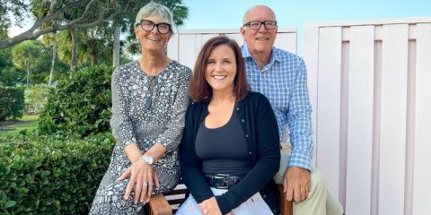 Sarah Cook with her parents, Norman and Lorena Cook.