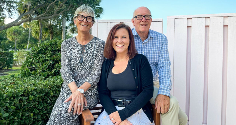 Sarah Cook with her parents, Norman and Lorena Cook.