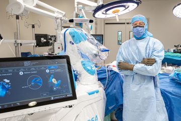 State-Of-The-Art Orthopedic Surgery At The JGH Changes Lives - The JGH’s Dr. David Zukor, all suited up to perform knee surgery with the latest donor-supported technology.