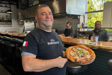 Lillo showcases one of his popular pizzas