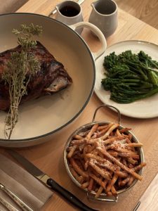 The slow-cooked bone-in lamb shoulder, with sides